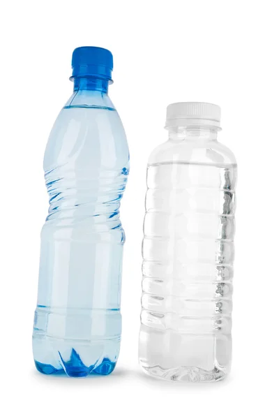 Dos botellas azules y no coloreadas con agua aislada —  Fotos de Stock