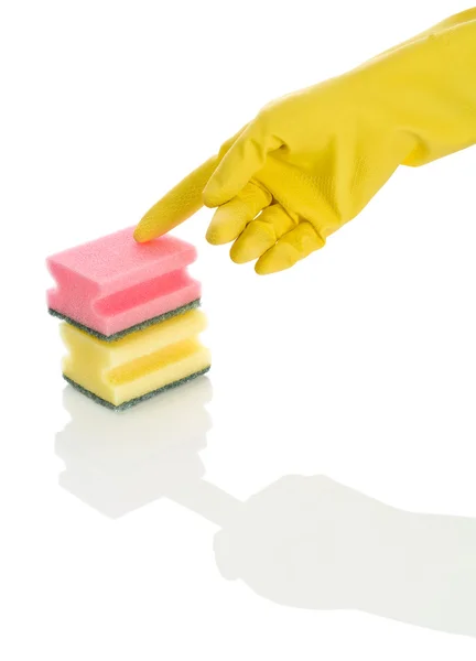 Two sponges and hand in glove — Stock Photo, Image