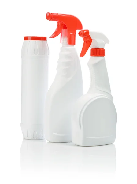 Três produtos de limpeza com capas vermelhas — Fotografia de Stock