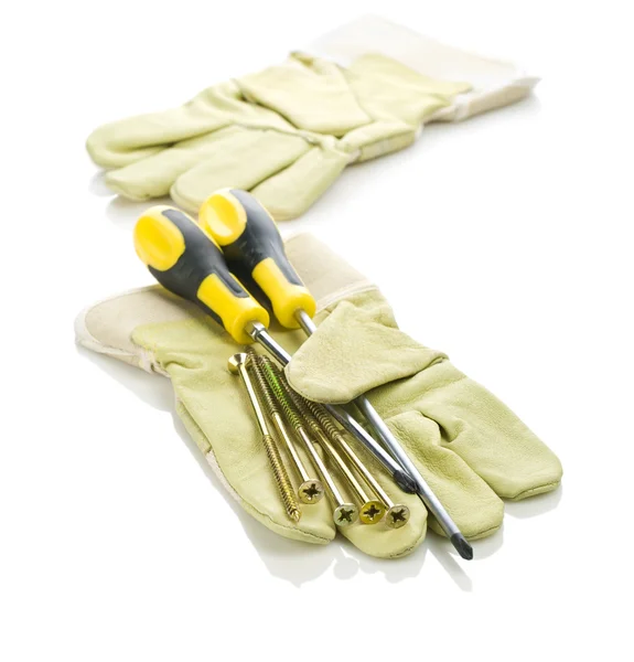 Skruvar och skruvdragare med handskar — Stockfoto
