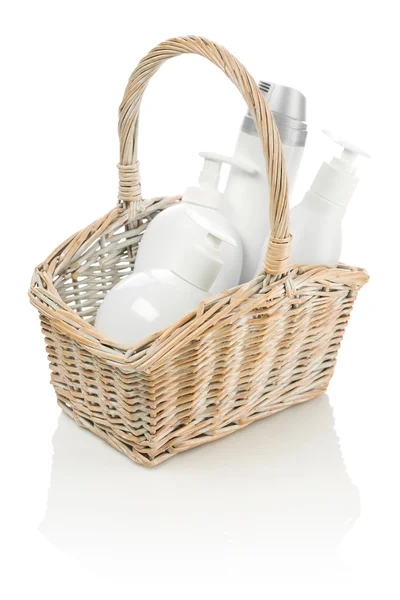 Botellas blancas en cesta marrón —  Fotos de Stock