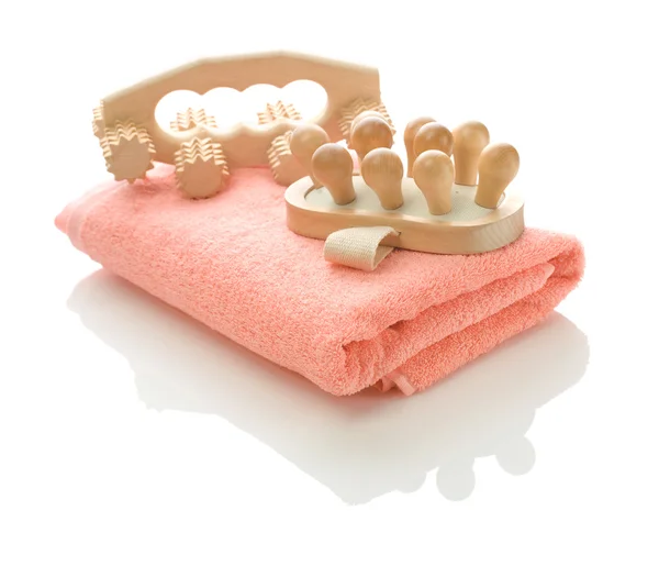 Pink towel with massagers — Stock Photo, Image