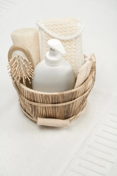 Wooden bucket on white towel — Stock Photo, Image