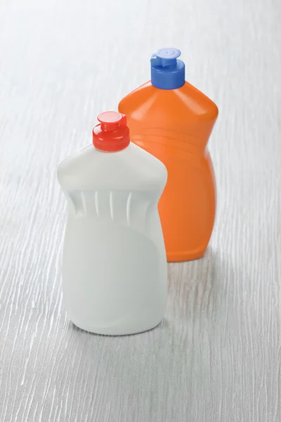 Bílé a oranžové láhve — Stock fotografie