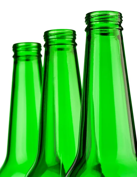 Parte superior de botellas verdes aisladas —  Fotos de Stock