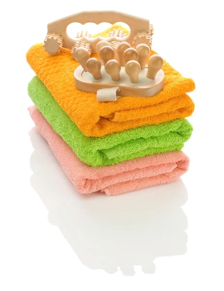 Wooden massagers on towels — Stock Photo, Image