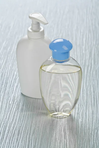 Transparent and white bottles — Stok fotoğraf