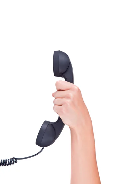 Un tube noir du téléphone à la main sur fond blanc — Photo