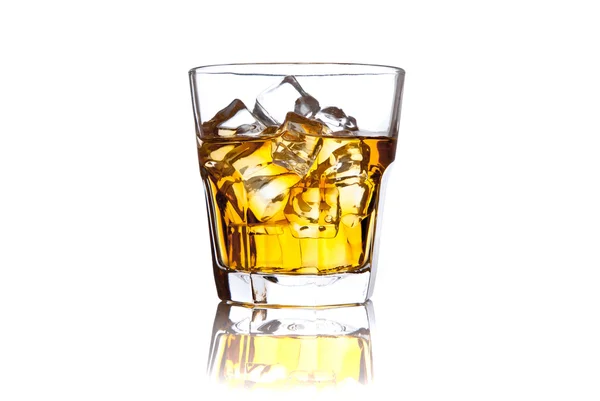 Glass of scotch whiskey and ice on white — Stock Photo, Image