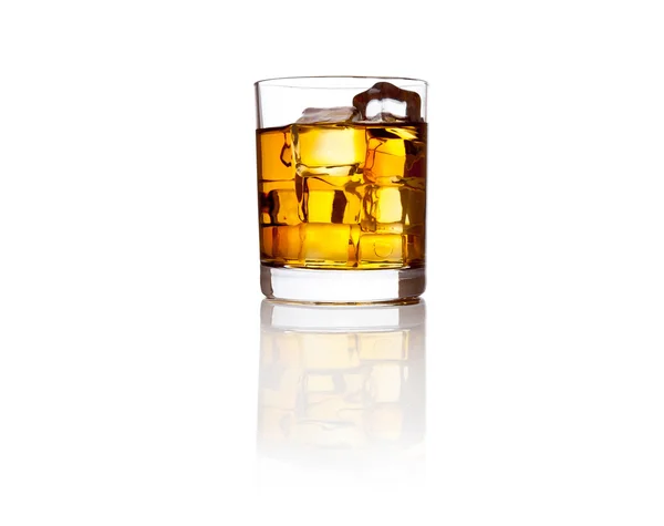 Glass of scotch whisky and ice on white — Stock Photo, Image