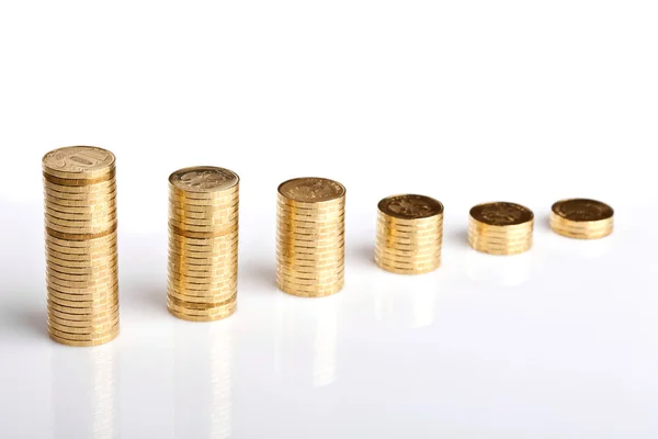 Columns of coins on white — Stock Photo, Image