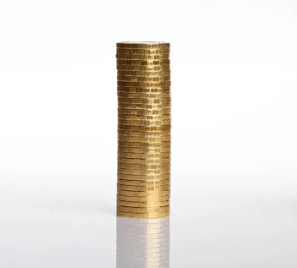 Column of coins on white — Stock Photo, Image
