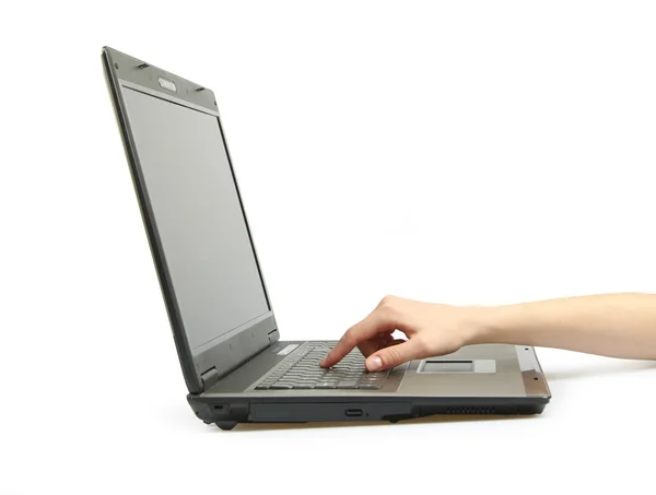 Hand on the laptop — Stock Photo, Image
