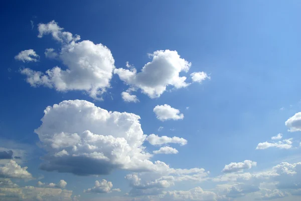 Stock image Blue sky background with tiny clouds