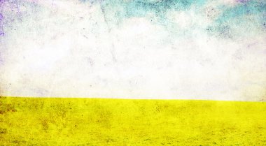 Grunge image of green field and blue sky clipart