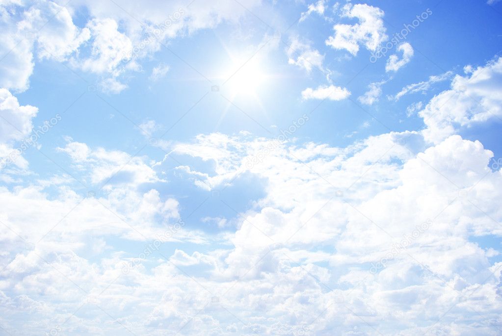 Sun in a blue cloudy sky