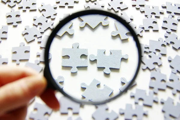 stock image Hand with magnifying glass