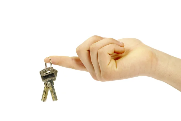 La mano sostiene una llave —  Fotos de Stock