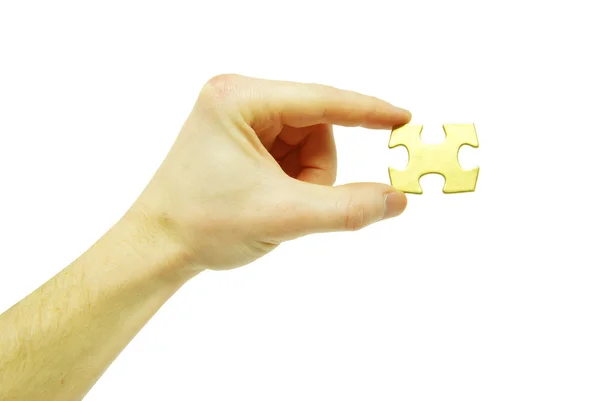 Puzzel in de hand — Stockfoto