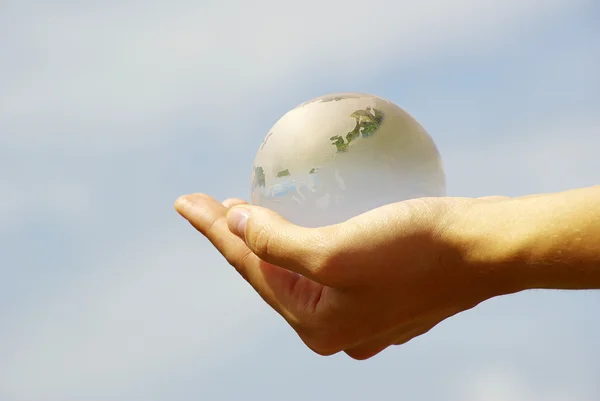 Globe in hand — Stock Photo, Image