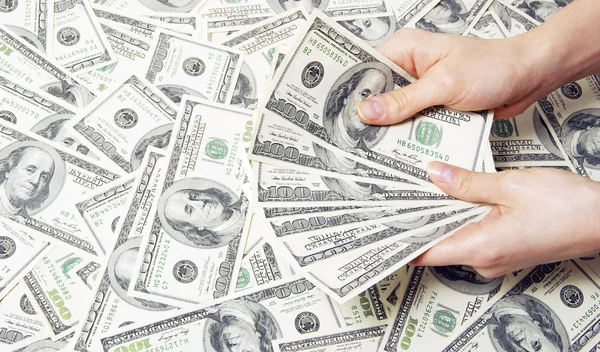 Hand with money Royalty Free Stock Images