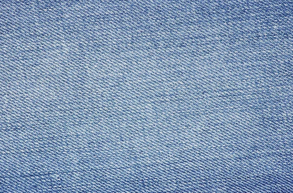 Фон синих джинсов — стоковое фото