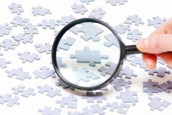 stock image Magnifying glass and puzzle