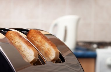 Bread toaster in the kitchen clipart