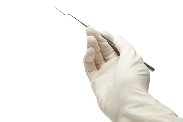 Χέρι του οδοντιάτρου που απομονώνονται σε λευκό φόντο. οδοντίατρος examinat — Φωτογραφία Αρχείου