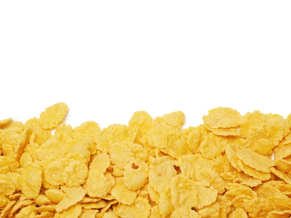 Cornflakes bakgrund med kopia utrymme över vita — Stockfoto