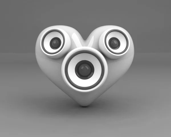 White heart with speakers over grey background — Stock Photo, Image