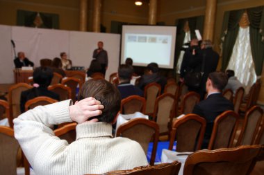 konferans salonu hareket izleyici dinler.