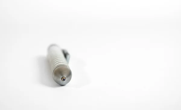 stock image Silver pen on a clean white sheet of boom. selectiv focus