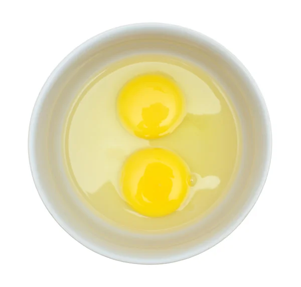 Crude eggs in a plate. — Stock Photo, Image