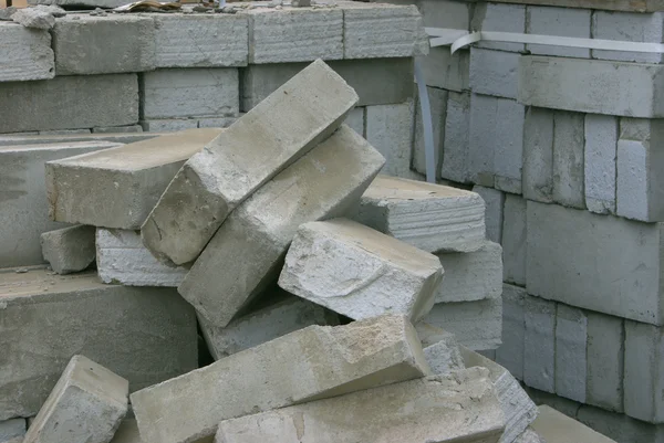 stock image Packed and scattered bricks on a building site.