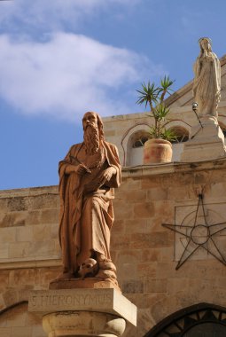 Statues of Saint Jerome and Catherine clipart