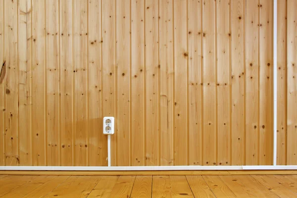 stock image Wooden interior with domestic power outlet