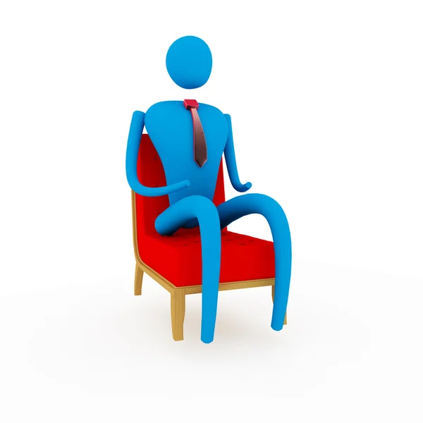 Человек, сидящий в кресле — стоковое фото