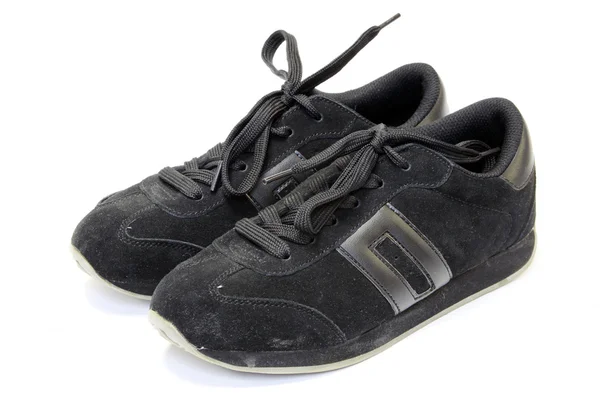 Zapatillas de running negras sobre fondo blanco —  Fotos de Stock