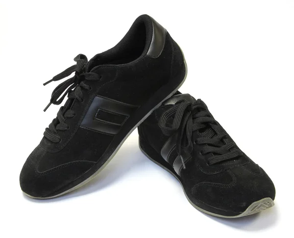 Zapatillas de running negras sobre fondo blanco —  Fotos de Stock