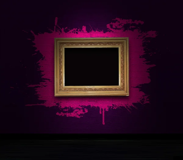 Frame with splashes on a dark wall — Stock Photo, Image