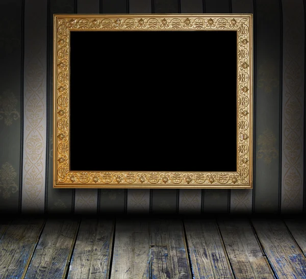 Retro grungy interior with antique picture frame — Stock Photo, Image