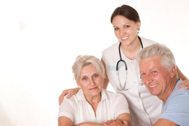 Woman doctor and an elderly couple clipart