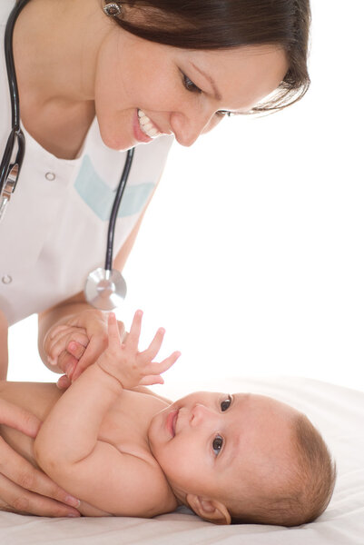 Doctor examining newborn