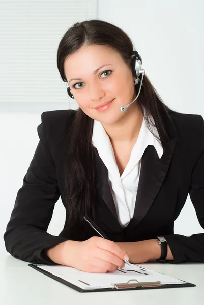Nice girl in a black business suit with a white — Stock Photo, Image