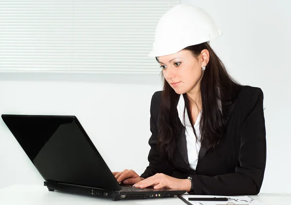 Nice woman in a business suit working — Stock Photo, Image