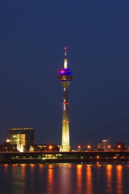 Media Port (Medienhafen) and Rheinturm tower Dusseldorf at night clipart