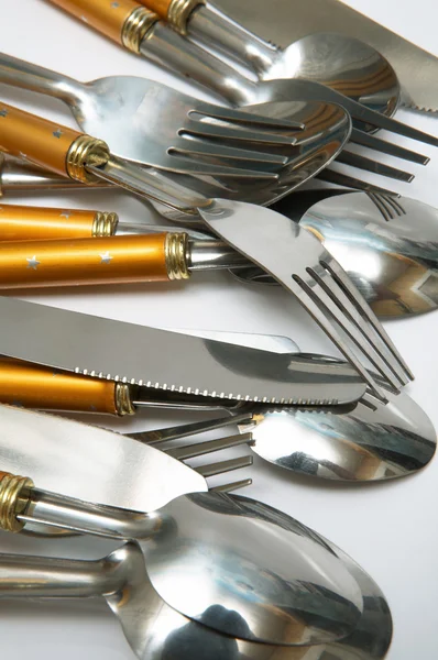 Cucchiai, spine e coltelli — Foto Stock