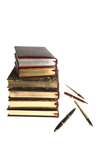 Książki ze złota i długopisy — Zdjęcie stockowe