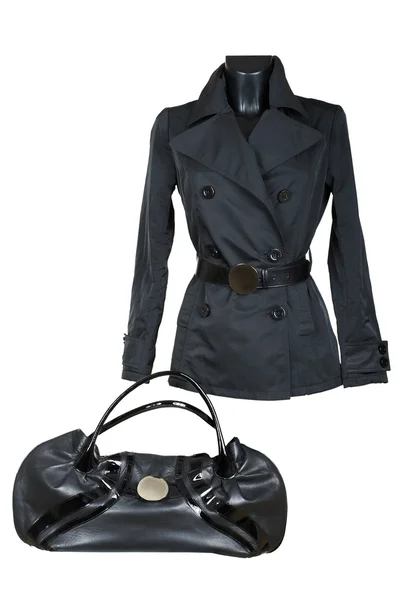 Женская куртка и сумка — стоковое фото